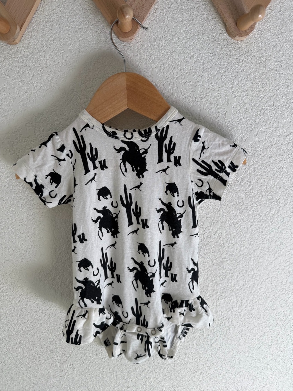 Kate Quinn Western Print Onesie